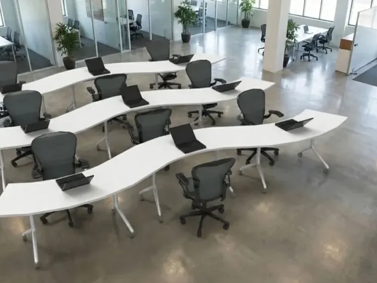 Wave Tables – Curved tables for open, team rooms.